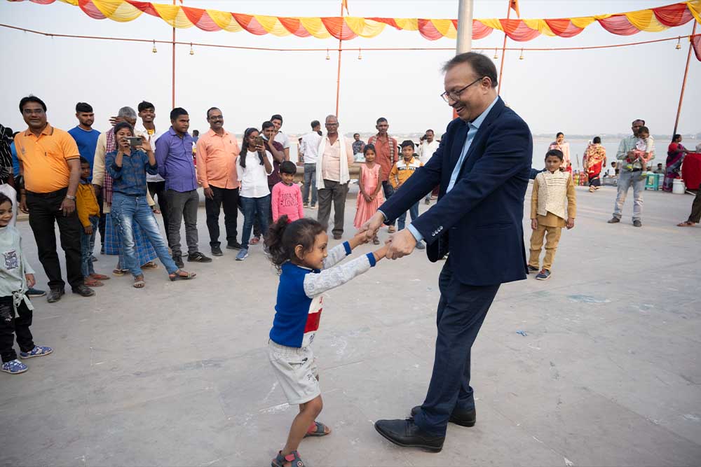Dr Subodh playing with a child