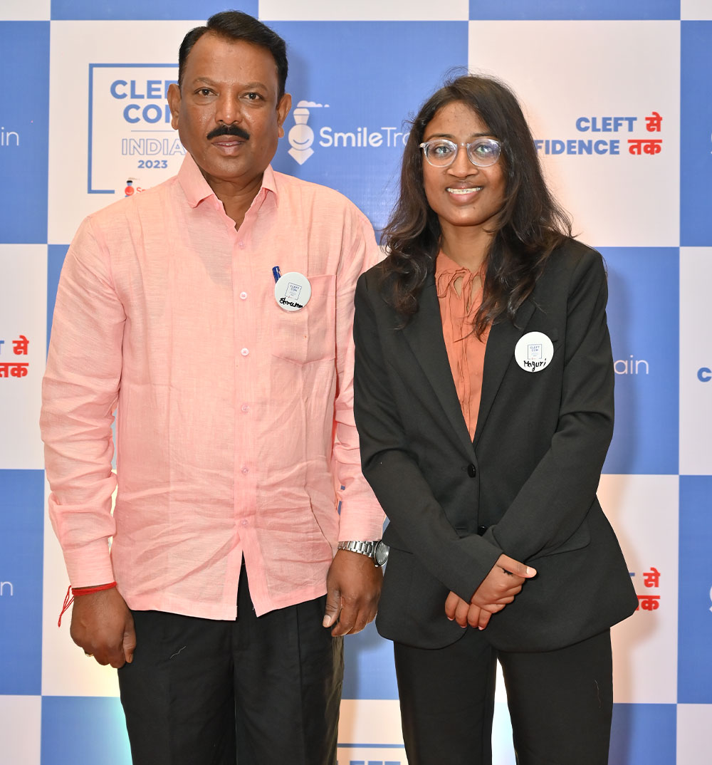 Dr Mayuri Kalyanpad smiling with her father at Cleft Con India
