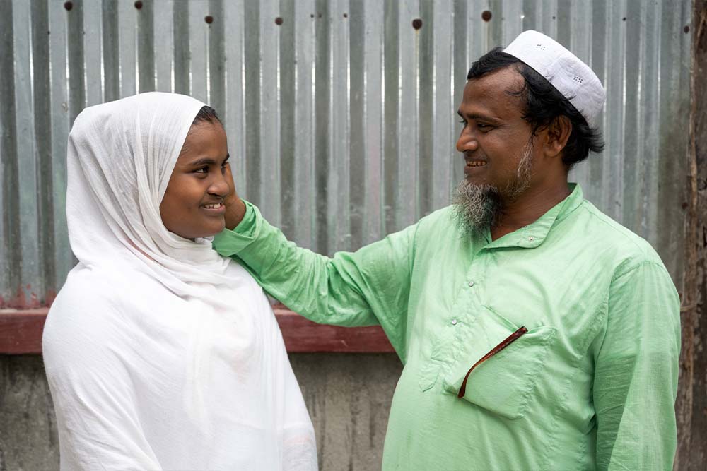 A doting father showering his love and blessings