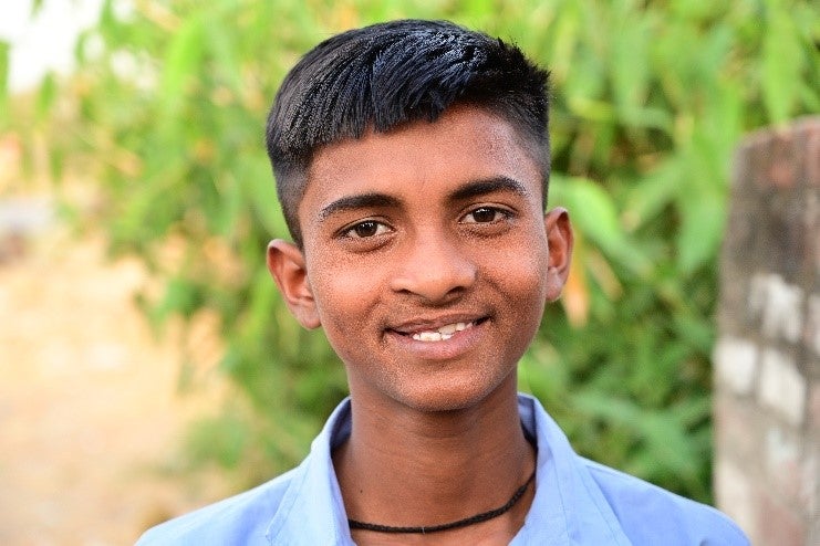 Monu smiling after cleft surgery