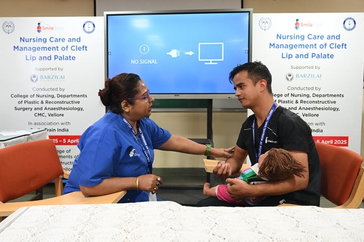 Two Indian nurses training