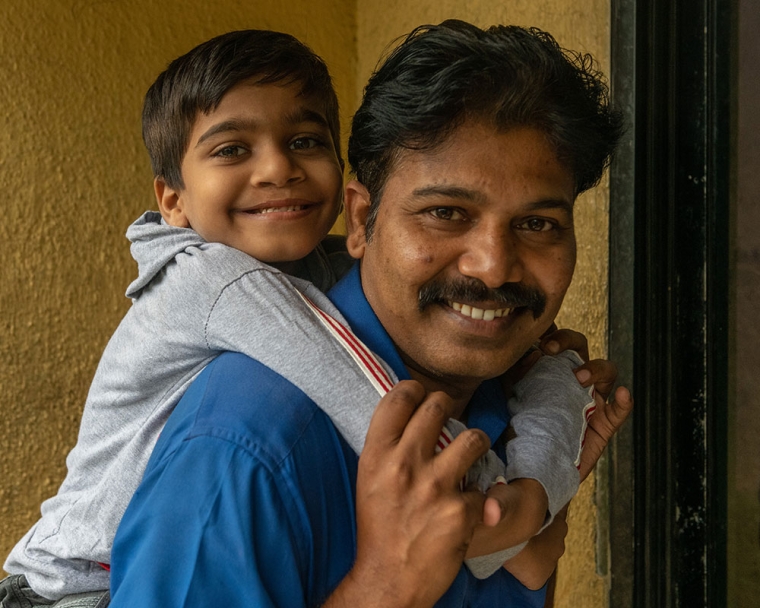 Samrat smiling with his father