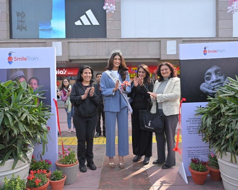 Shweta Sharda smiling and clapping with Anjali Katoch, Mamta Carroll and Renu Mehta