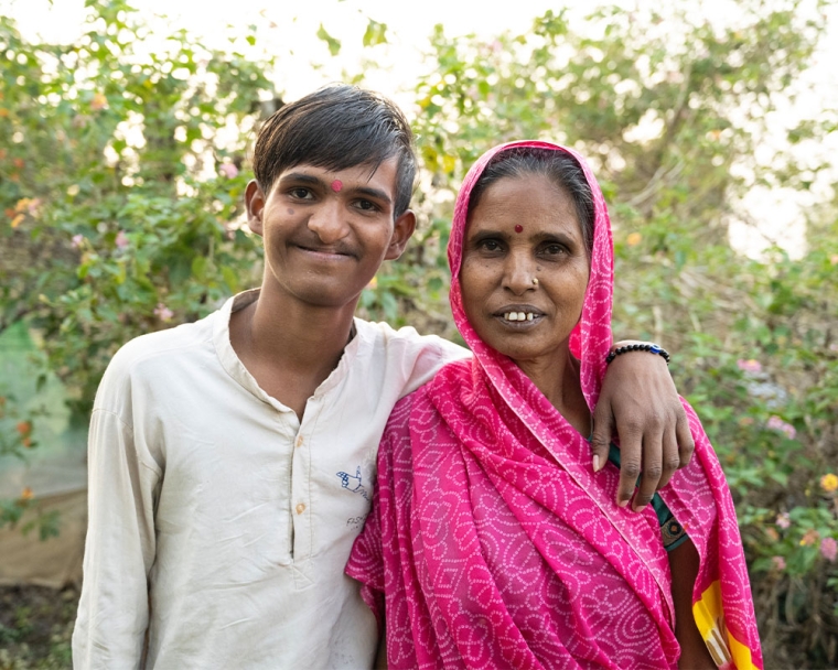 Sujal smiling with his mother Malti after cleft surgery