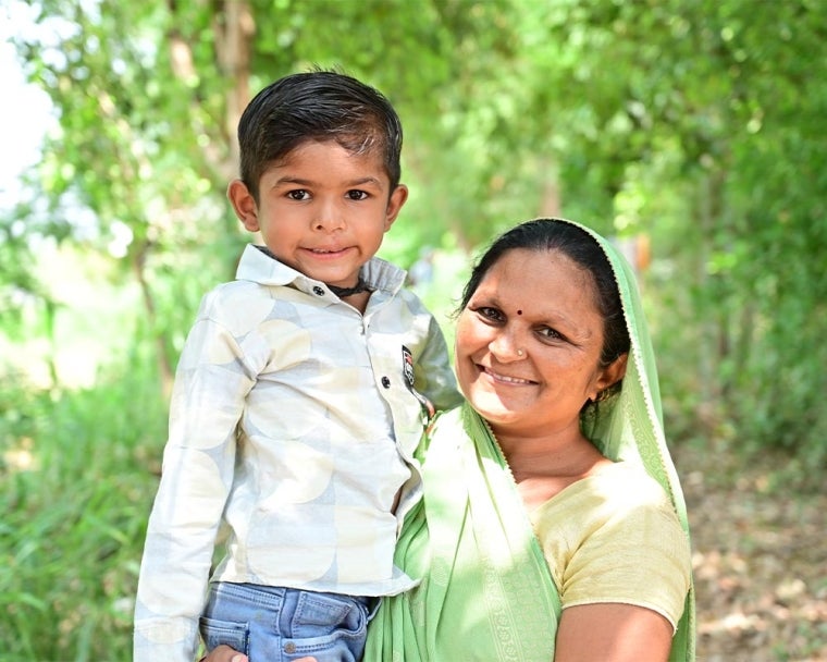 Jairaj smiling with his mother after cleft surgery