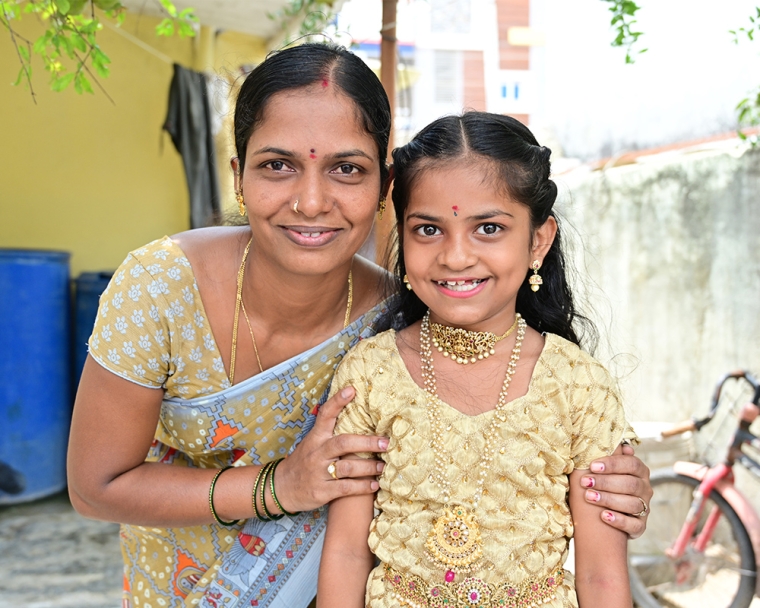 Pravallika smiling with her mother after cleft surgery